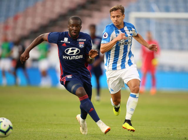 Lyon's Tanguy Ndombele (left) has also been linked with Spurs.