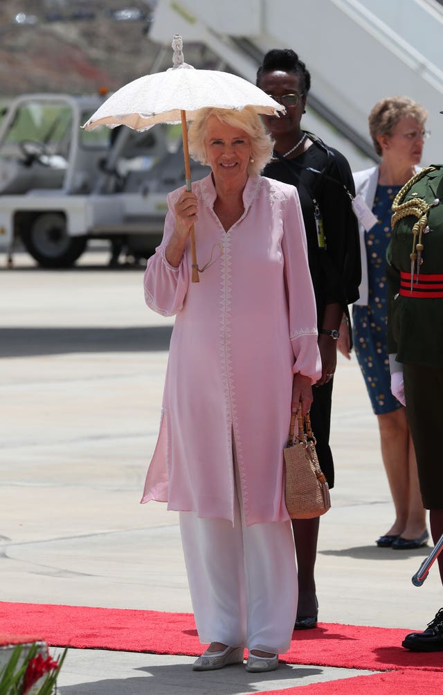 Camilla arrives at Argyle International Airport