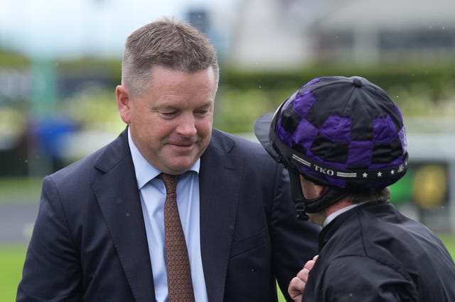 Paddy Twomey with jockey Wayne Lordan after the victory of One Look
