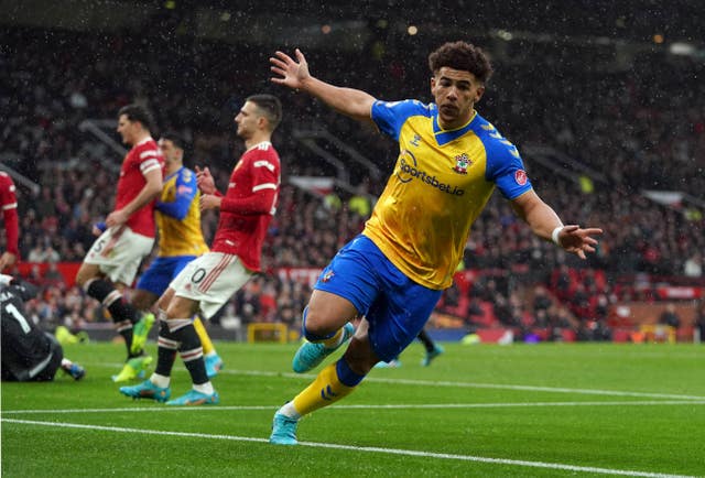 Che Adams celebrates