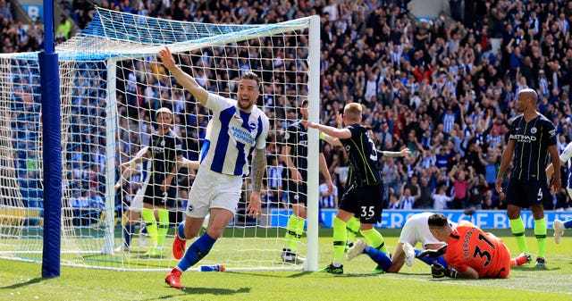 Shane Duffy celebrates after Glenn Murray puts Brighton in front 