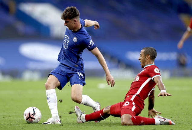 Liverpool’s Thiago Alcantara, right, made a positive impression on his Premier League debut at Chelsea