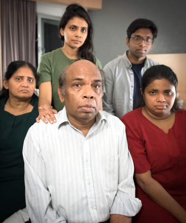 Sangarapillai Balachandran (centre) is due to fly from the UK with his family on Monday.
