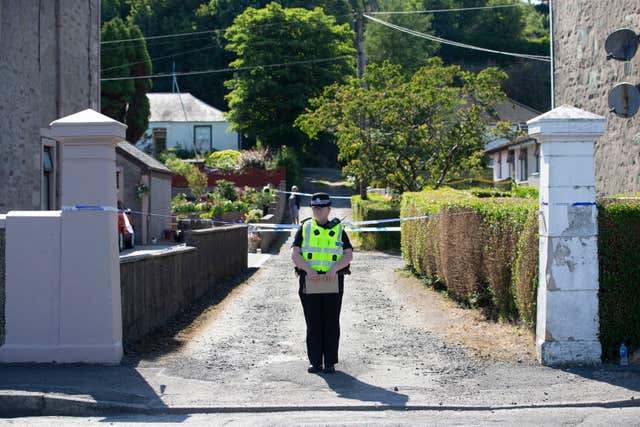 A police cordon outside a house on Ardbeg Road on the Isle of Bute