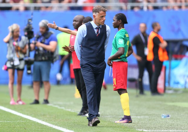 Phil Neville shows his displeasure during the game against Cameroon