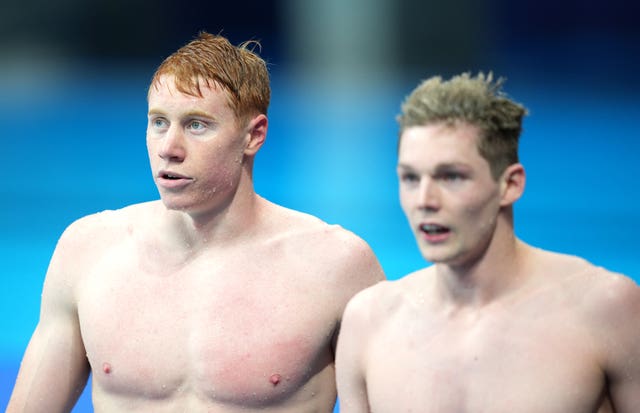 Tom Dean, left, and Duncan Scott claimed a historic one-two for Team GB (Joe Giddens/PA)