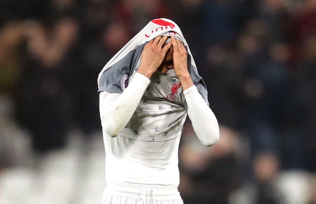 Liverpool’s Fabinho shows his disappointment at the draw (Adam Davy/PA).