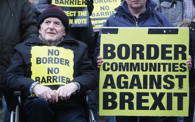 Anti-Brexit placards held by people living near the Irish border