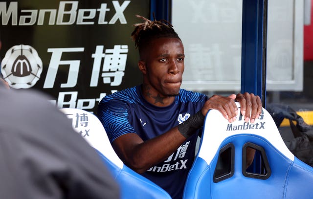Wilfried Zaha was on the bench for Crystal Palace after a failed deadline-day move to opponents Everton