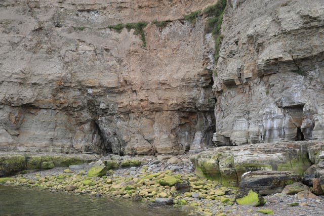 The bottom of the cliff face near the beach at Seaton Garth in Staithes