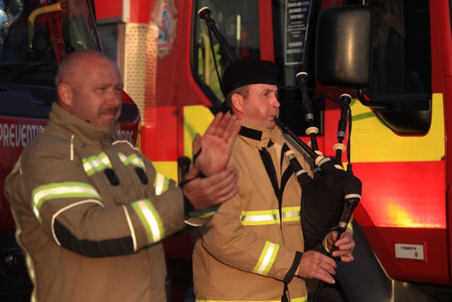 Firefighter Andy Burns plays the bagpipes at Tynemouth Community Fire Station