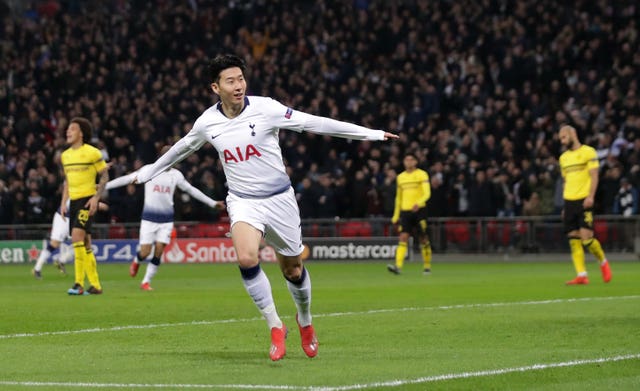 Son Heung-min celebrates scoring against Dortmund