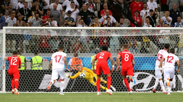 Ferjani Sassi, second right, equalised for Tunisia from the spot