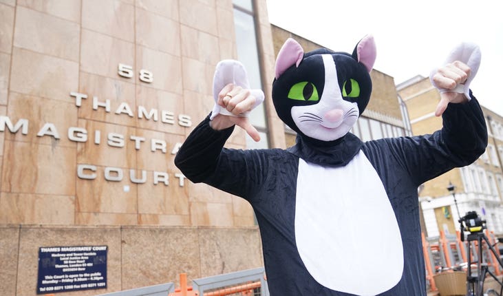 A person dressed as a cat outside Thames Magistrates’ Court