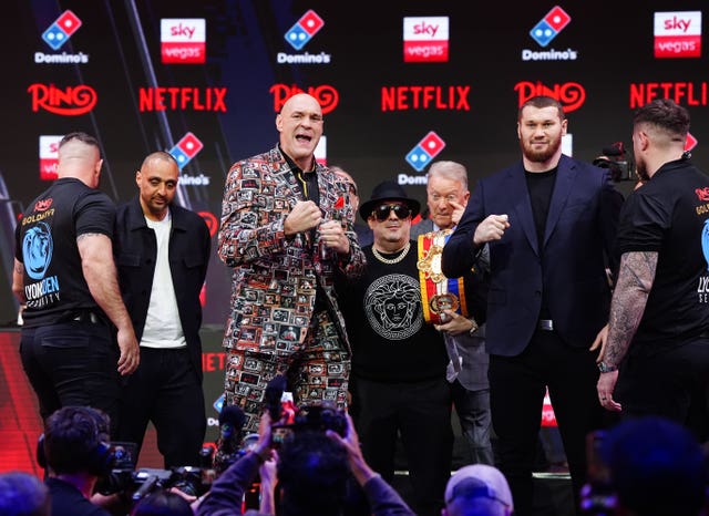 Tyson Fury and Arslanbek Makhmudov during a press conference