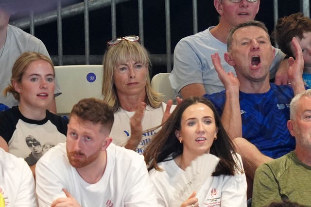 (second row from back, left to right) Amelie, Kate and Gerry McCann in the stands cheering on their son and brother Sean McCann taking part in in the men’s 400m freestyle at the Tollcross International Swimming Centre, Glasgow