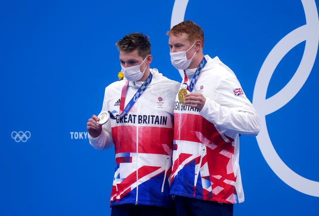 Dean, right, and Scott, left, are the first British male swimmers to share a podium since the 1908 London Games (Adam Davy/PA)