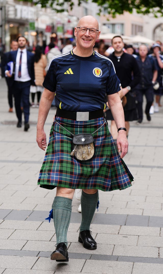 First Minister of Scotland John Swinney wearing a Scotland top and a kilt in Munich during Euro 2024