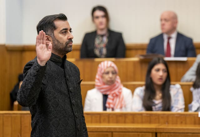 Mr Yousaf takes the oath as he is sworn in as First Minister of Scotland at the Court of Session in 2023 