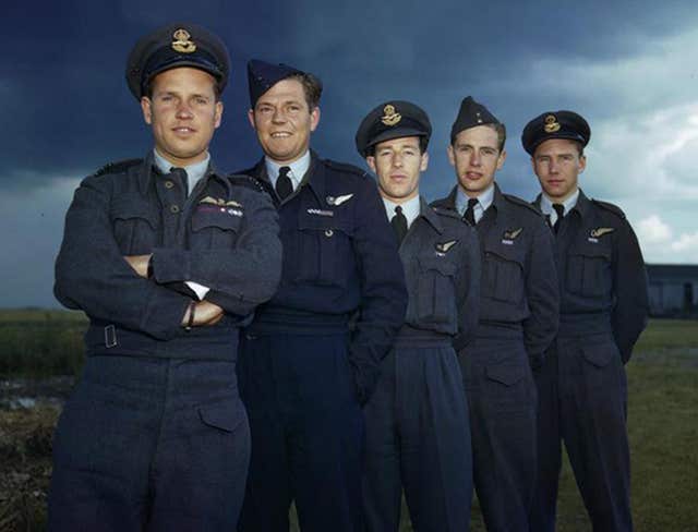 Leader of the Dambusters raid Wing Commander Guy Gibson, with members of his Lancaster crew, (left to right) Pilot Officer PM Spafford, bomb aimer; Flight Lieutenant REG Hutchinson, wireless operator; Pilot Officer GA Deering and Flying Officer HT Taerum, gunner (Imperial War Museum/PA)