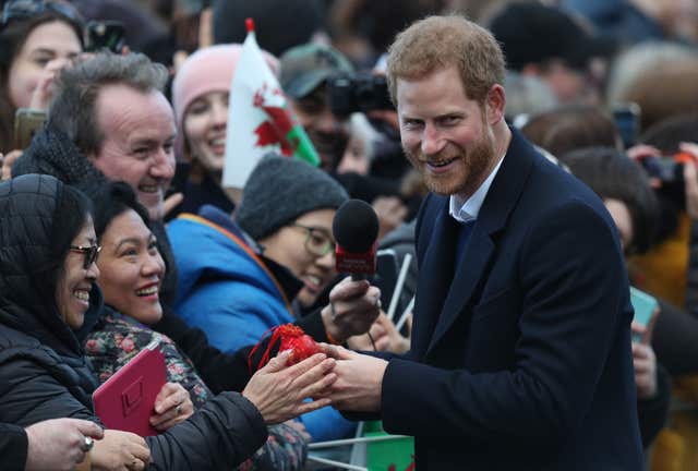 Prince Harry apologised to wellwishers after the couple's train was delayed (Andrew Matthews/PA)