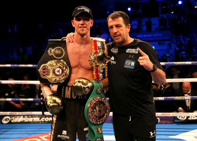 Callum Smith, left, successfully defended his WBA World, WBC Diamond ans Ring Magazine super-middleweight titles in a controversial win over John Ryder in Liverpool