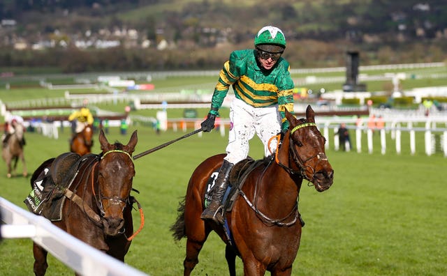 A riderless Buveur D'Air finishes alongside Espoir D'Allen