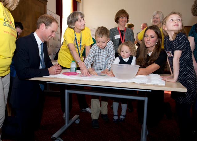 The then-Cambridges meeting youngsters at the headquarters of the charity Child Bereavement UK in 2013