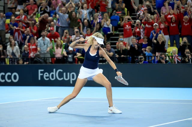 Katie Boulter punches the air after beating Kazakhstan's Zarina Diyas