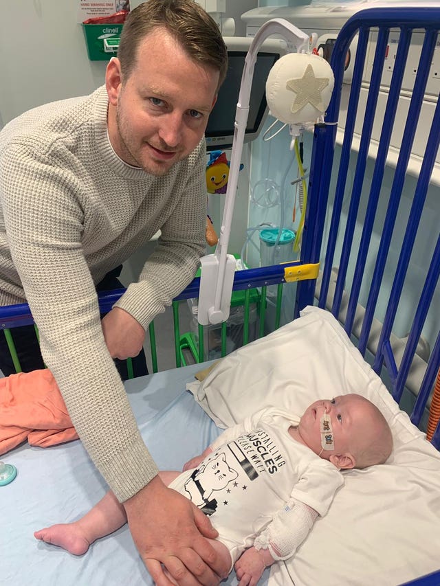 Five-month old Arthur Morgan with his father Reece Morgan