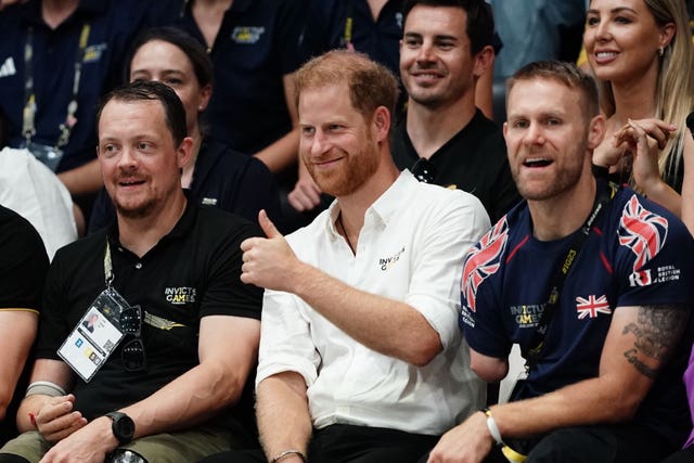 The Duke of Sussex gives a thumbs up while in the crowd watching an Invictus Games event