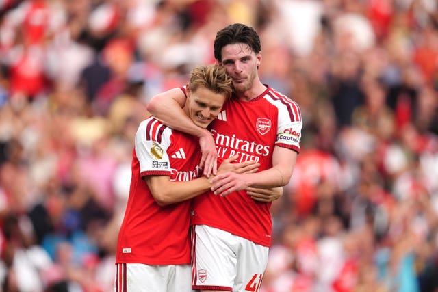 Declan Rice celebrates the win with team-mate Martin Odegaard
