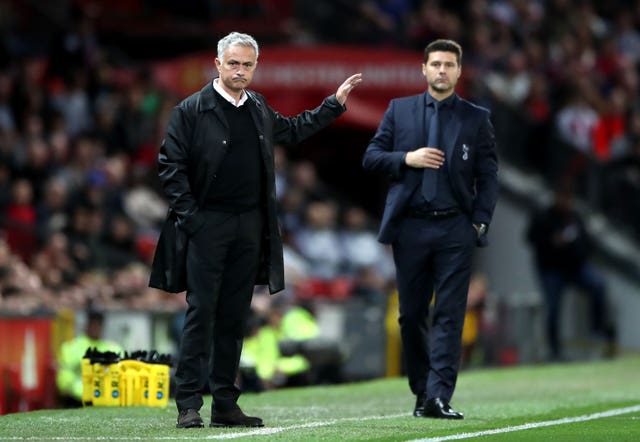 Jose Mourinho, left, reacted angrily to reporters following a loss to Mauricio Pochettino's Tottenham