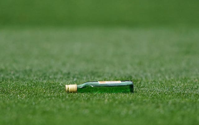 A glass bottle that was thrown onto the pitch