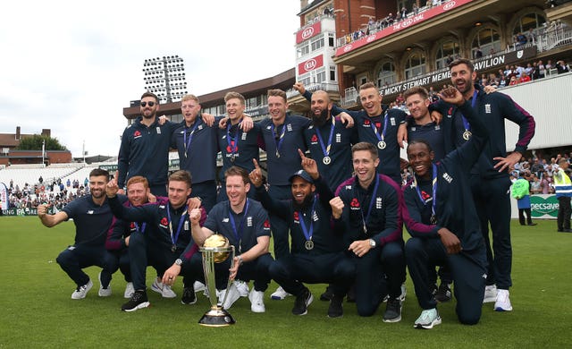 Chris Woakes, Eoin Morgan and the rest of the England team celebrate their World Cup win 