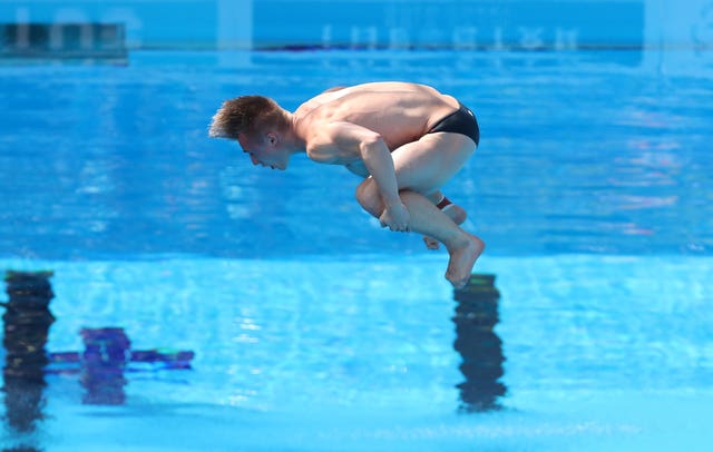 England's Jack Laugher responded from qualifying in fifth to win the men's 3m springboard by a huge margin