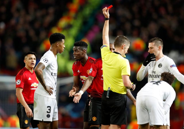 Paul Pogba, centre, was sent off in the first leg of the Champions League last 16 clash at Old Trafford (Martin Rickett/PA)