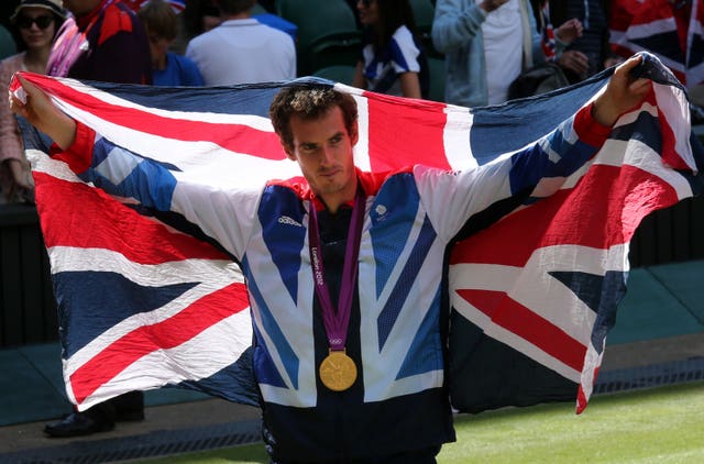 Andy Murray with his gold medal after beating Roger Federer