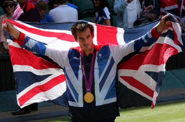 Andy Murray with his gold medal after beating Roger Federer