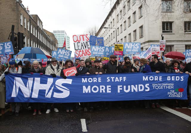 Shadow Health Secretary Jon Ashworth MP (centre left, shirt and tie) joins the march (Yui Mok/PA)