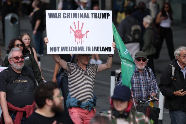 People take part in an anti-Trump protest march through Dublin city centre