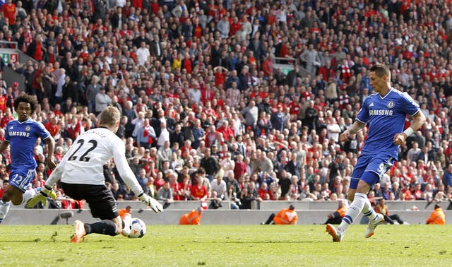 Mignolet, left, is one of only three remaining Liverpool players from that defeat five years ago 