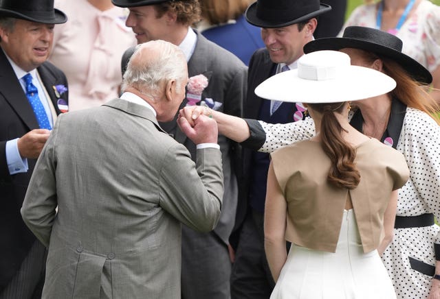 King Charles kisses the hand of Sarah, Duchess of York