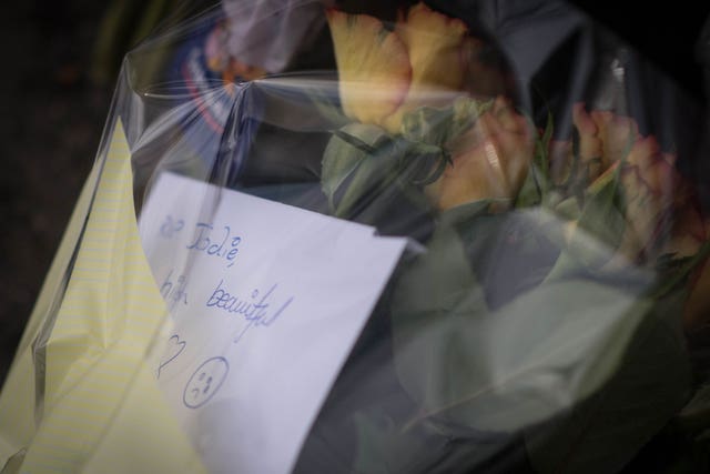 Flowers near the scene in Harold Hill Jodie Chesney, was stabbed to death (Stefan Rousseau/PA Wire)