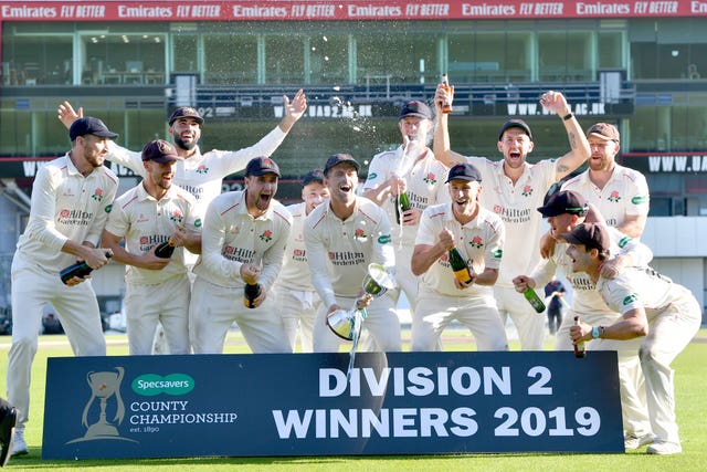 Vilas, centre, captained Lancashire to County Championship Division Two glory last year (Anthony Devlin/PA)