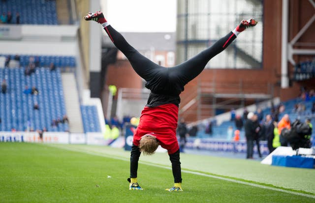 Hearts goalkeeper Zdenek Zlamal warms up in unique fashion