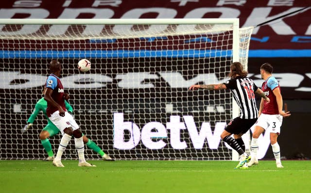 Jeff Hendrick, second right, scores Newcastle's game-clinching second goal at West Ham
