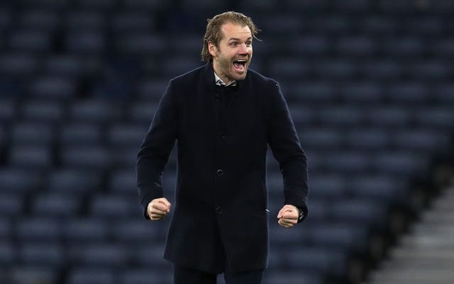 Hearts manager Robbie Neilson celebrates after beating Hibs in the semi-finals 