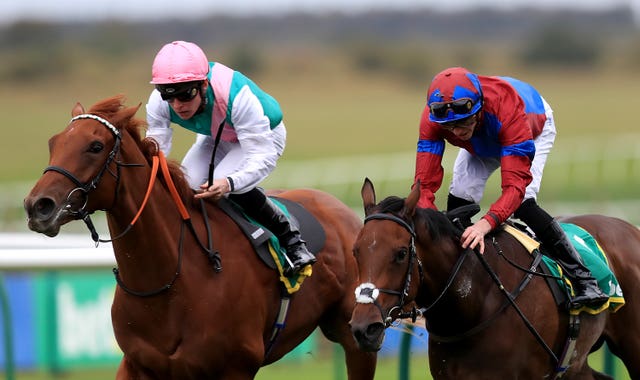 Quadrilateral (left) lands the Fillies' Mile