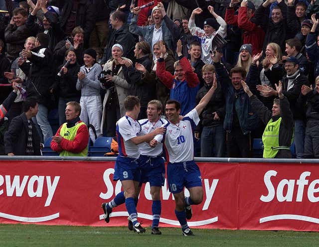 John Peterson (number 10) celebrates acoring the second goal for the Faroe Islands against Scotland in Toftir